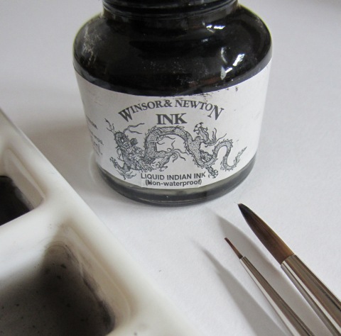 Ink bottle and brushes
